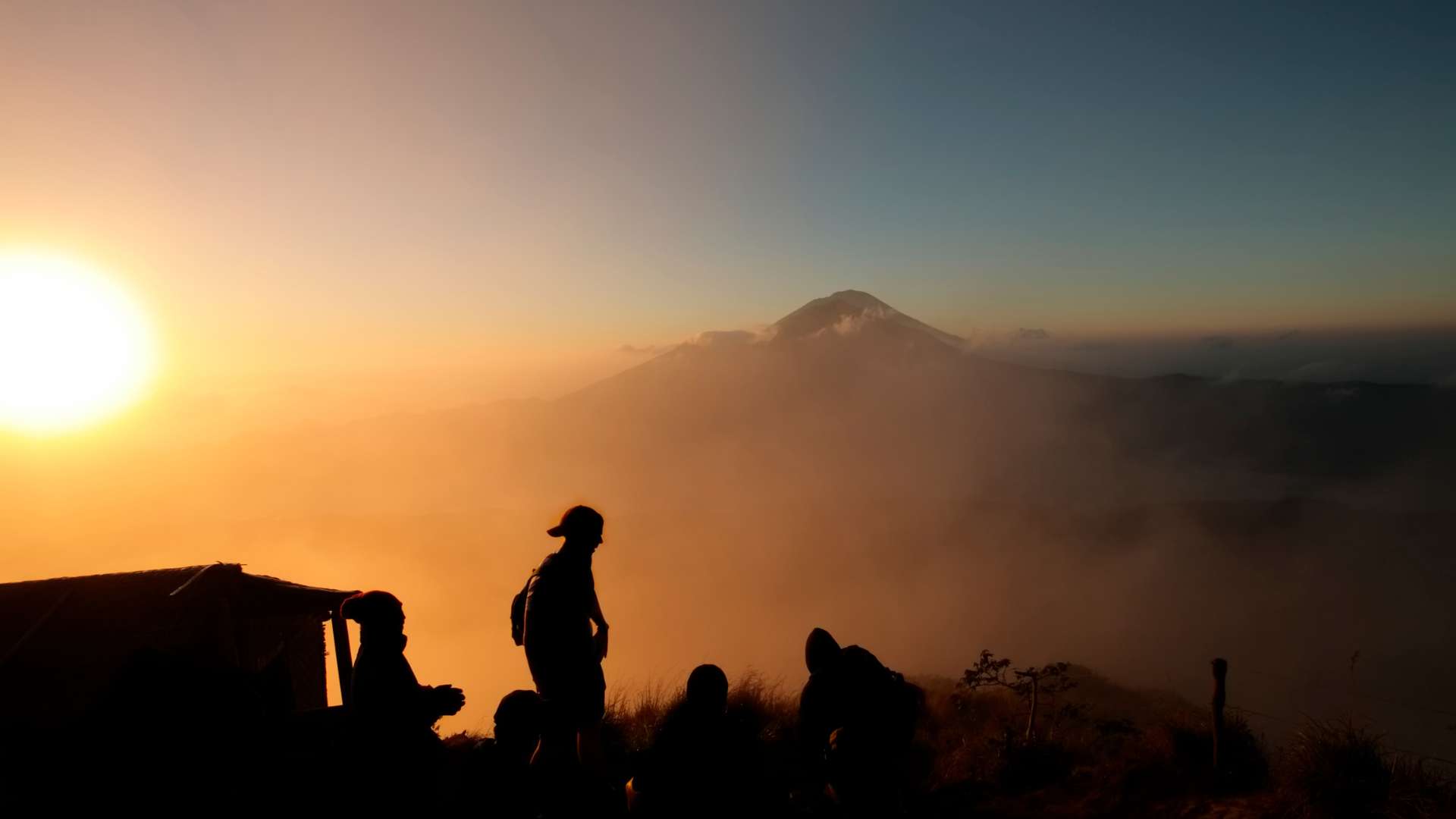 Conquer Mount Batur at sunrise, unwind in hot springs.