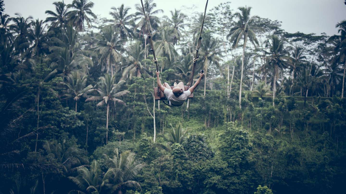 Embark on an unforgettable adventure with our Ubud Jungle Swing, Temple & Waterfall Tour